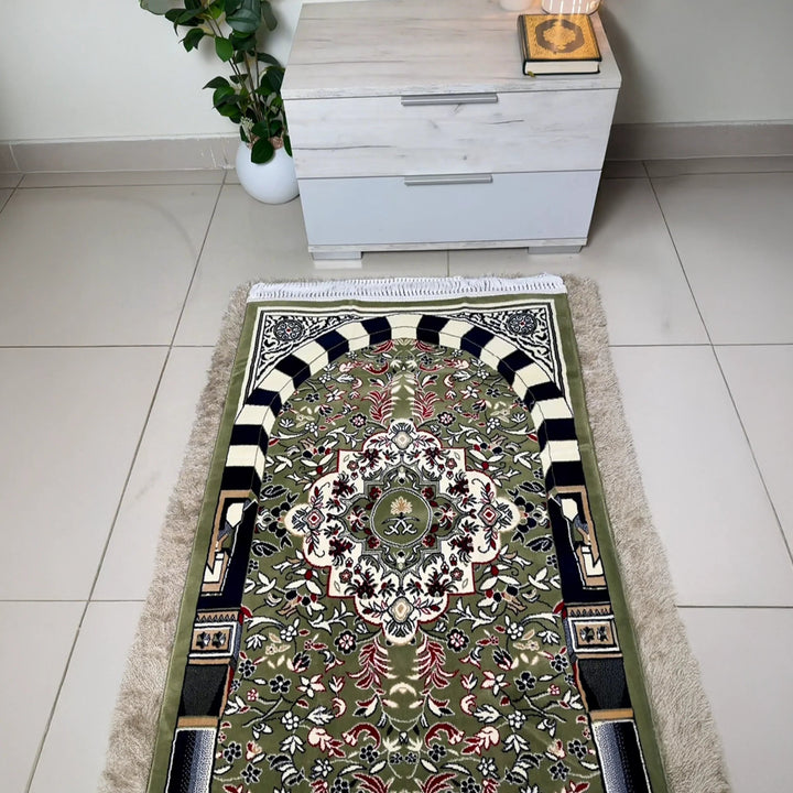Decorative rug with intricate patterns on a tiled floor next to a white cabinet.