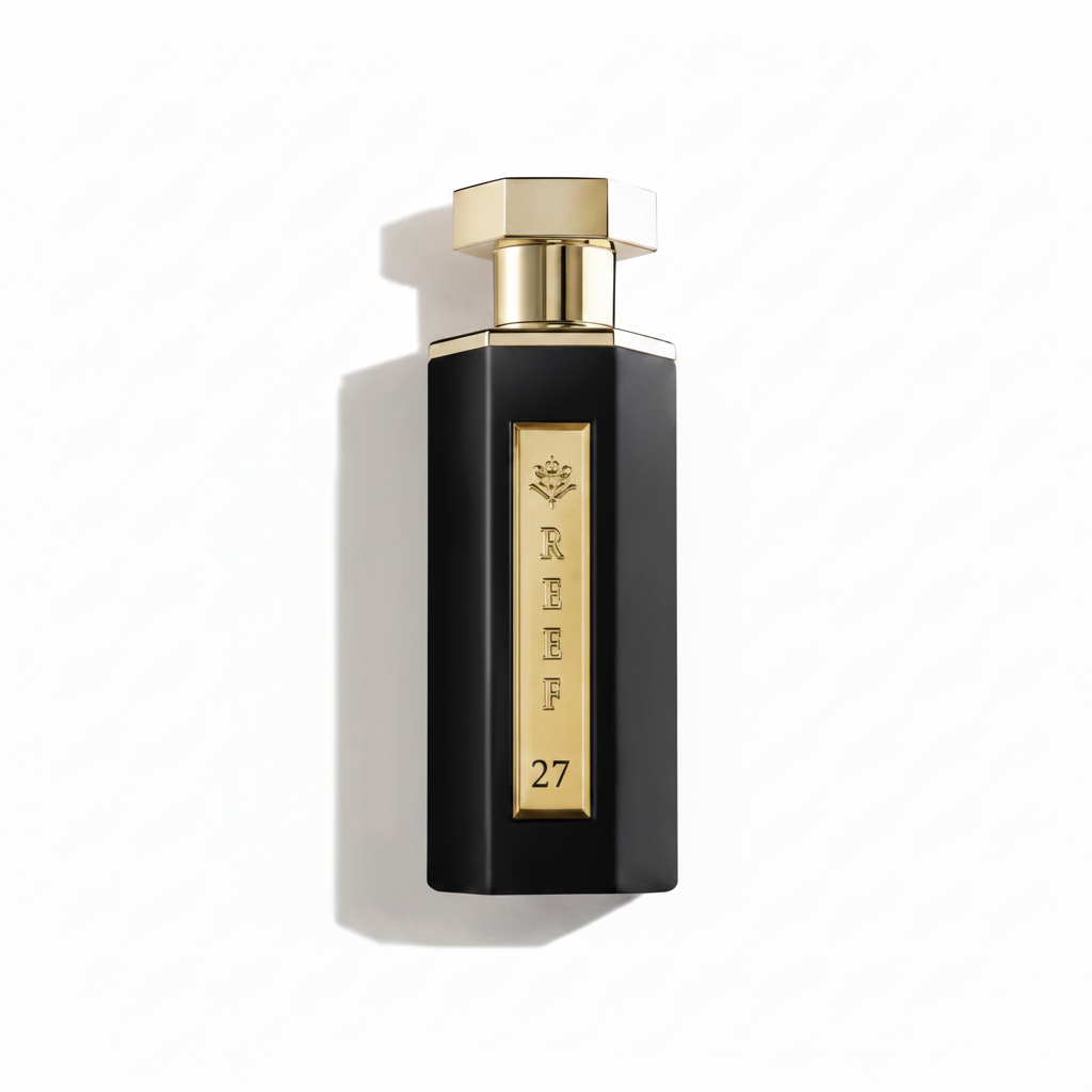 A black rectangular perfume bottle with a gold cap and a gold vertical label reading REEF 27, shown on a white background with a soft shadow. A faint large '27' watermark appears to the left.