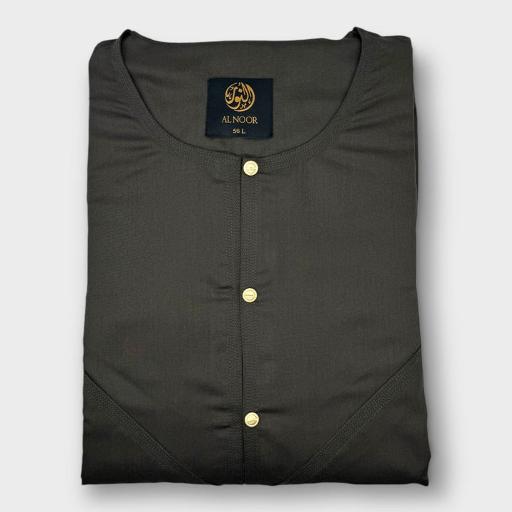 A Walnut Brown Al Noor brand relaxed fit thobe with a round neckline and two side pockets, displayed flat.