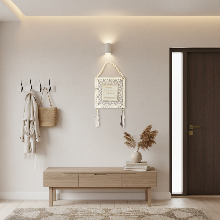 Decorative wall hanging with wooden beads and tassels on a white background